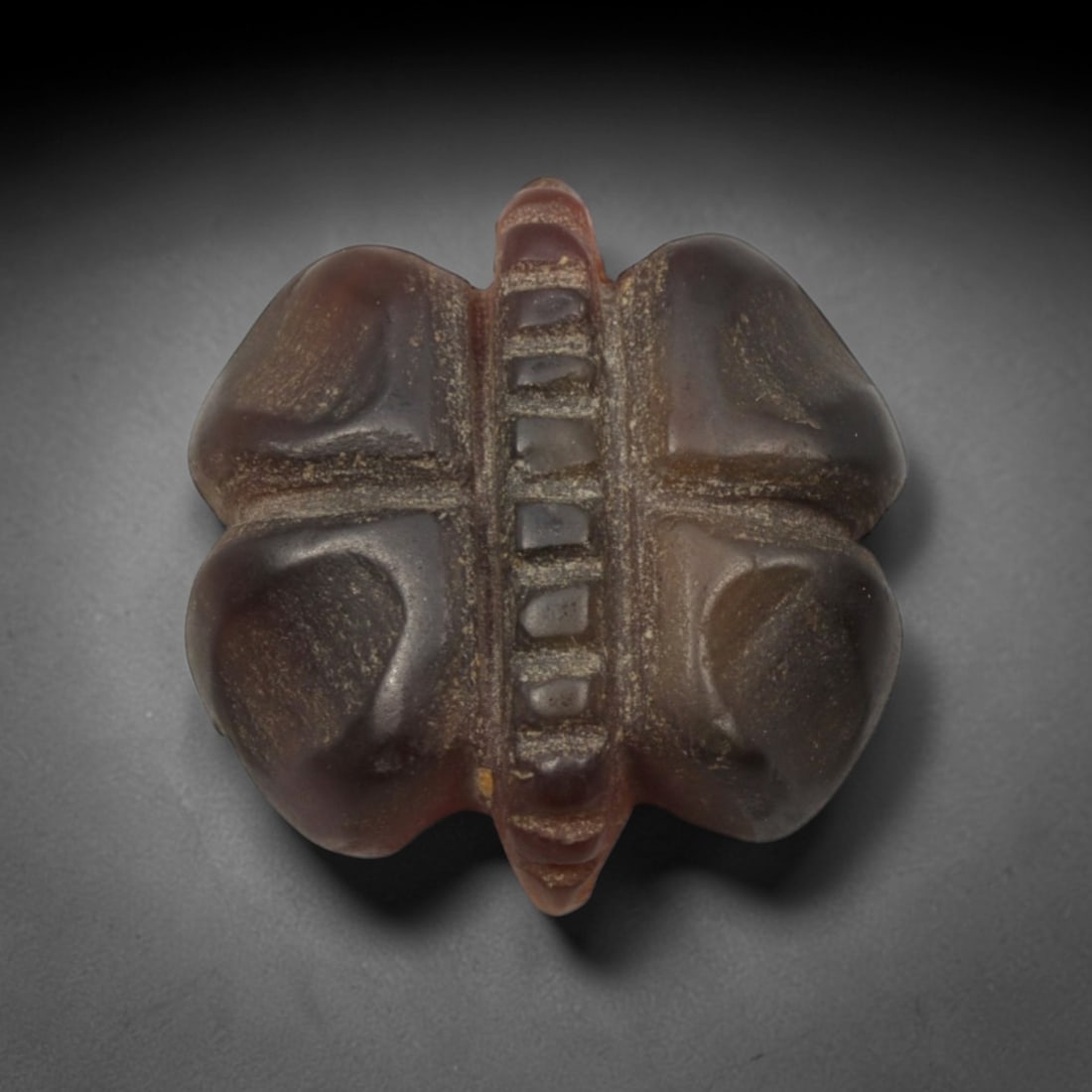 Ancient Carnelian Butterfly Amulet - Near Eastern Intaglio Pendant, 82XP: Carved from rich, translucent carnelian stone, this exquisitely detailed amulet depicts a stylized butterfly, a motif laden with symbolism in ancient Near Eastern and later Eurasian traditions associa