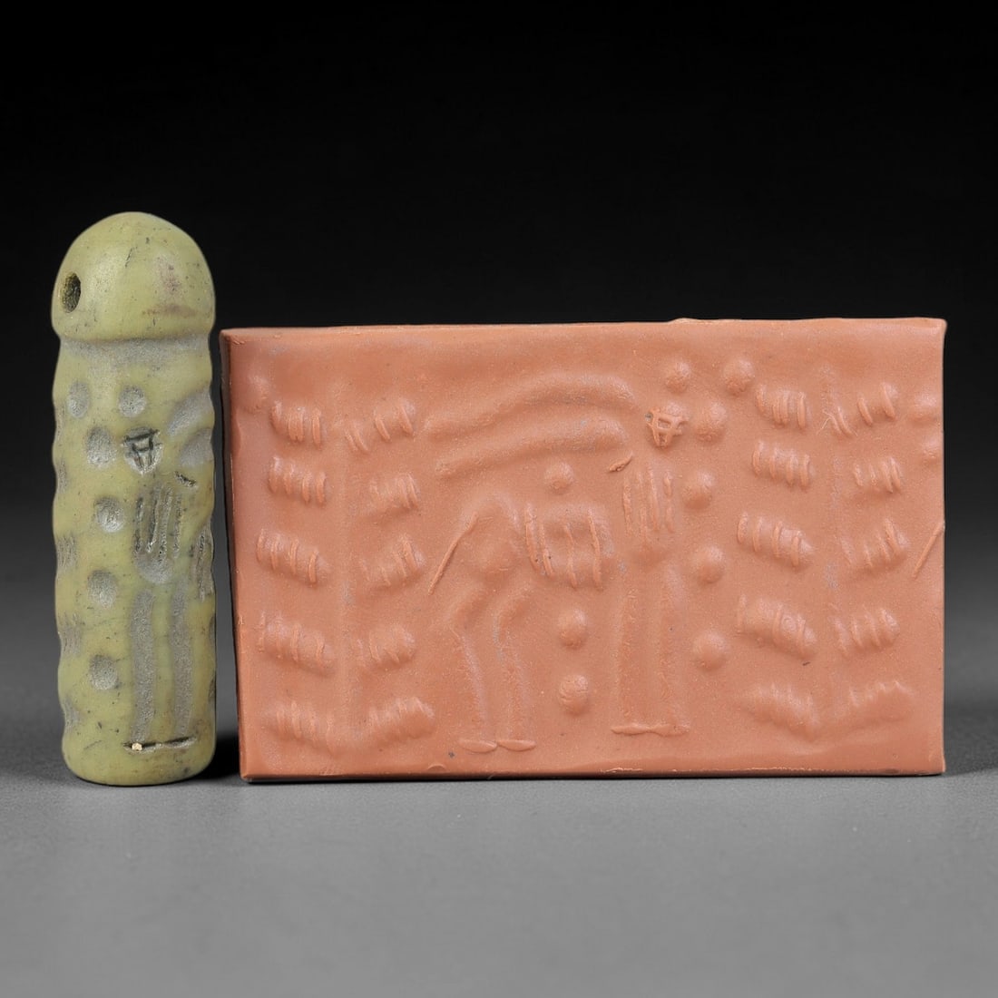 Ancient Serpentine Cylinder Seal - Mesopotamian, 62FX: Carved from serpentine, this cylinder seal follows the classic cylindrical form of ancient Mesopotamian administrative and ritual artifacts. Attributed to the Bronze Age Mesopotamian cultures, this se