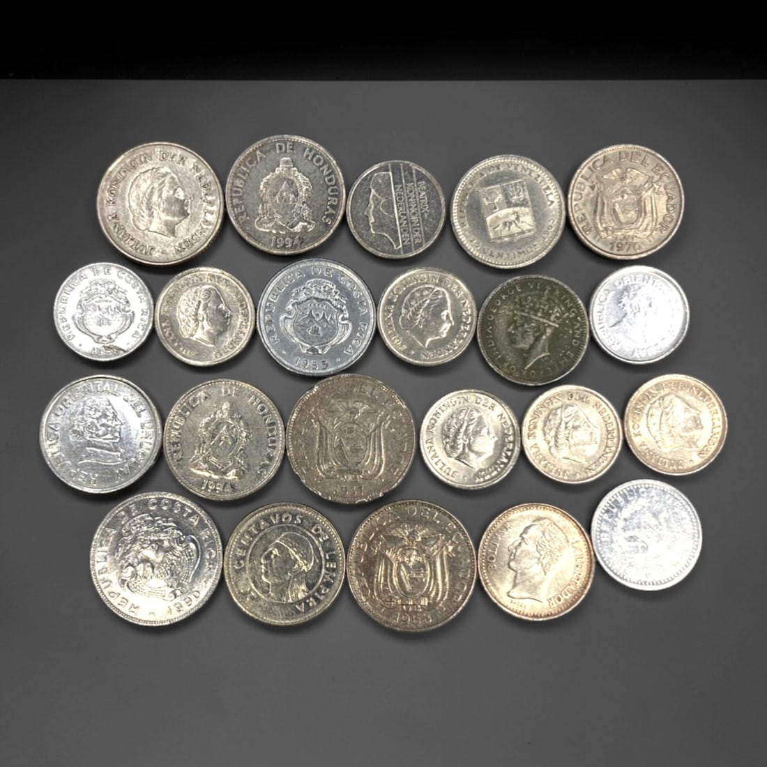 LATIN AMERICA & CARIBBEAN: Sovereign Continuity 22 Coins Assortment, 1953-1996, 15-20mm, 34ZJ: This curated 22-coin collection encapsulates the numismatic legacies of Latin America and the Caribbean, offering a tangible narrative of sovereign continuity and regional identity across four decades