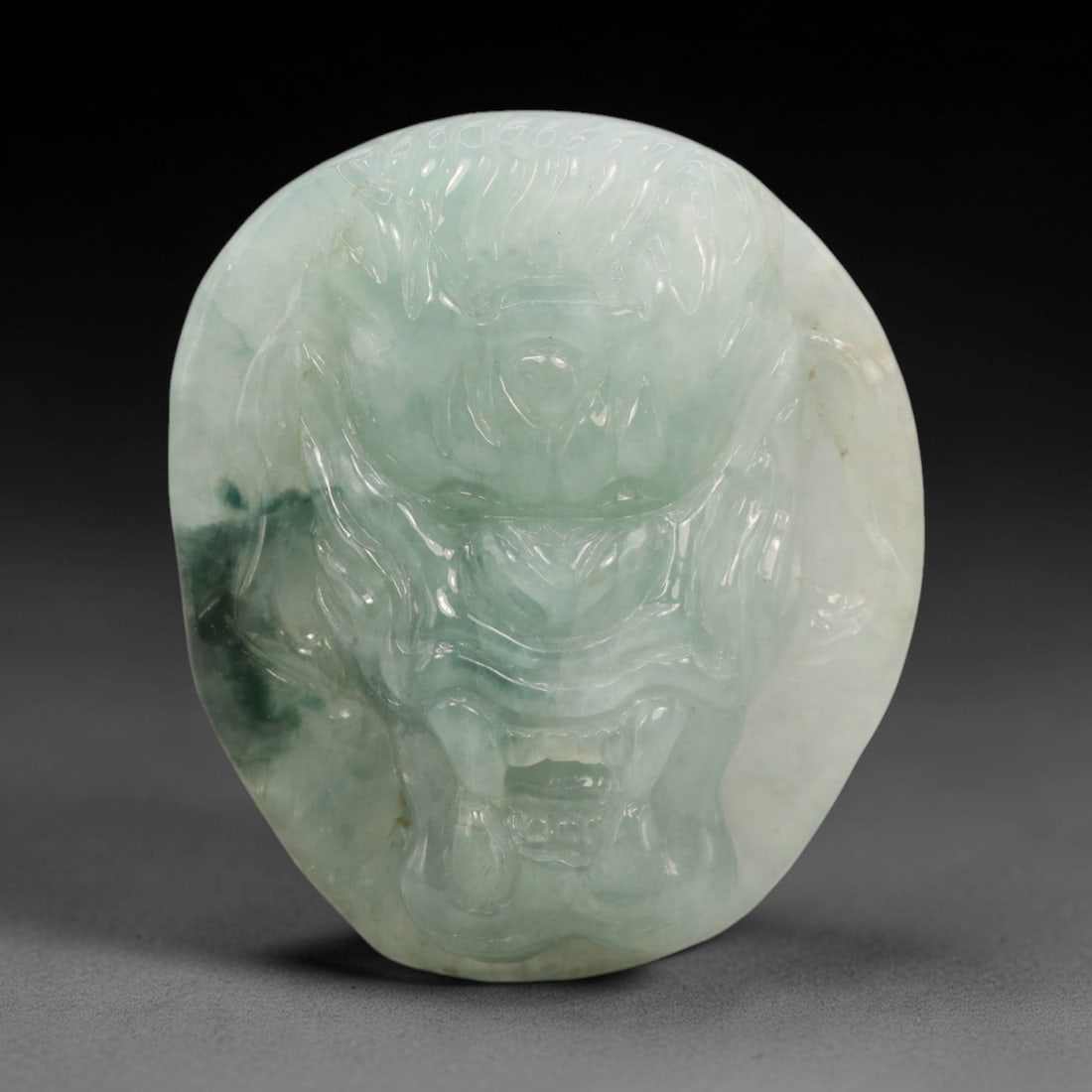 A Chinese Jadeite Jade Dragon Head Pendant, 20th Century, 15ZL (1 of 2)