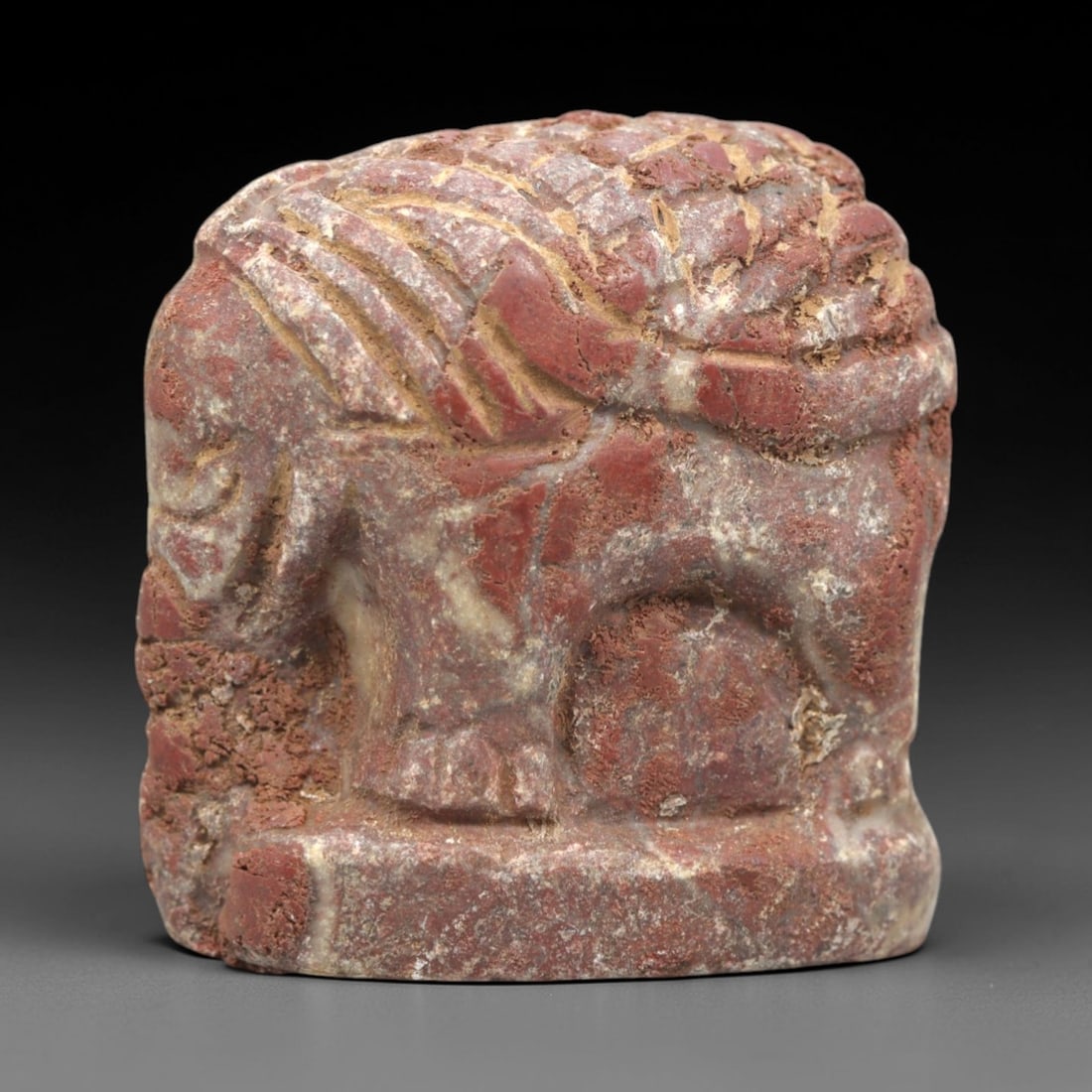 Ancient Jasper Elephant Effigy - Indus Valley Figurine, 29ZR: This artifact is a carved jasper elephant effigy, executed in the stylized zoomorphic tradition of the ancient Indus Valley civilization. The effigy depicts a compact, robust elephant form with incise