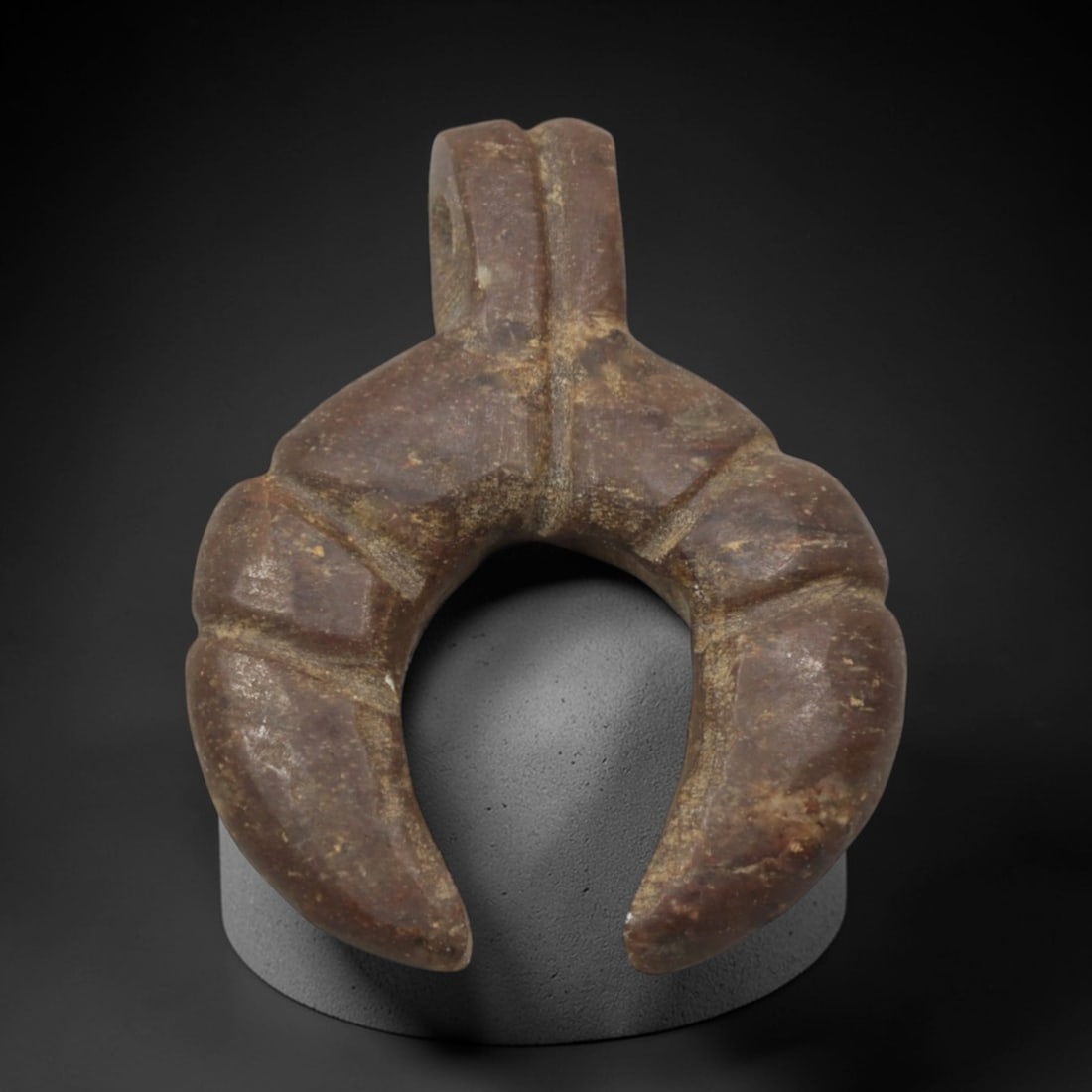 Ancient Brown Stone Claw-Form Pendant - Near Eastern Ritual Amulet, 2XQ: Carved from a rich, earthy brown stone with natural mineral inclusions, this miniature pendant takes the stylized form of a claw or talon, a potent motif in ancient Near Eastern ritual art associated