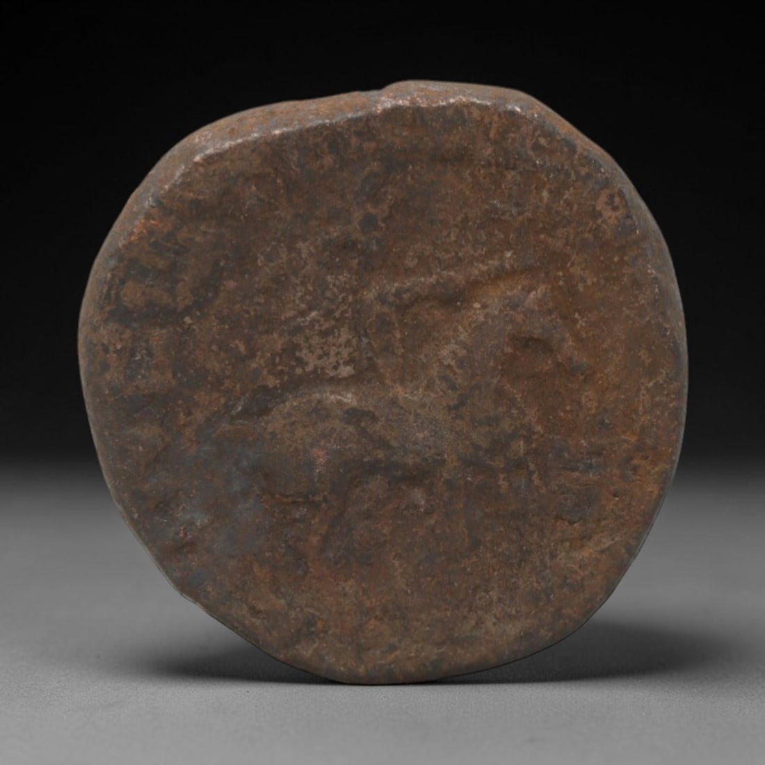 KUSHAN EMPIRE: Horseman Type - Bronze Coin, 2nd-3rd Century CE, 21mm, 7.4g, 11AK: This coin features a horseman motif on the obverse and a divine figure on the reverse, reflecting the cultural syncretism of the Kushan Empire. The patinated surface and well-preserved details highlig