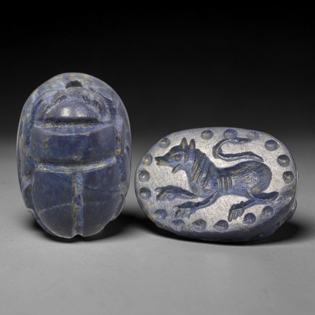 Ancient Lapis Lazuli Scarab - Near Eastern Zoomorphic Seal, 76AS: This artifact is hand-carved from lapis lazuli, utilizing traditional ancient lapidary techniques consistent with Near Eastern Bronze Age seal craftsmanship. The object takes the form of a scarab beet