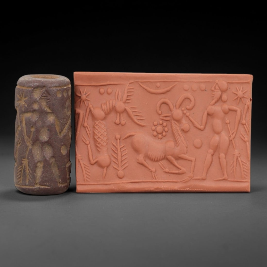 Ancient Steatite Cylinder Seal - Mesopotamian Ibex Scene, 23ZP: Carved from steatite with a rich, earthy patina, this ancient Mesopotamian cylinder seal features a finely rendered ibex and figural scene, executed with precise glyptic craftsmanship typical of Mesop