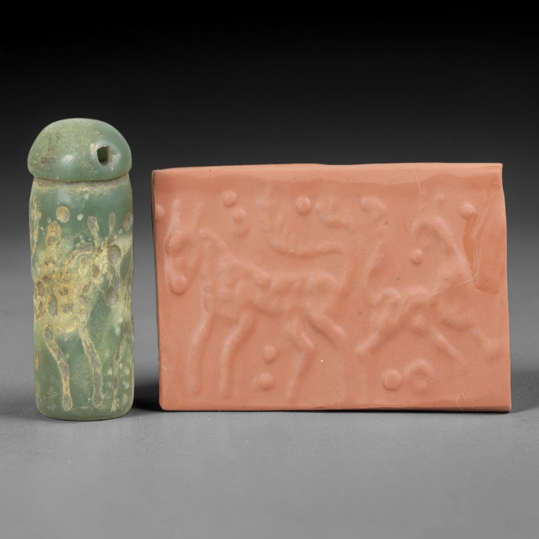 Ancient Serpentine Cylinder Seal - Mesopotamian, 74FX: Carved from serpentine, this cylinder seal follows the classic cylindrical form of ancient Mesopotamian administrative and ritual artifacts. Attributed to the Bronze Age Mesopotamian cultures, this se