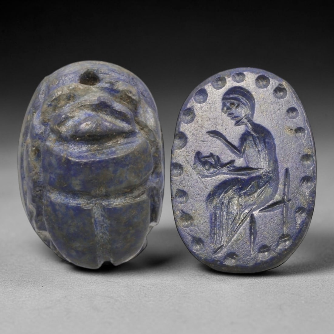 Ancient Lapis Lazuli Scarab - Near Eastern Figural Seal, 62AS: This artifact is hand-carved from lapis lazuli, employing traditional ancient lapidary techniques consistent with Near Eastern Bronze Age seal craftsmanship. The object takes the form of a scarab beet