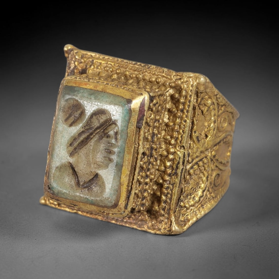 Antique Qajar Dynasty Green Stone Portrait Intaglio Ring - Size 7 US, 91FY: Crafted from gilt brass with a substantial square bezel, this ring features a carved green stone intaglio at its center, depicting an incised profile portrait motif characteristic of Qajar-era Persian