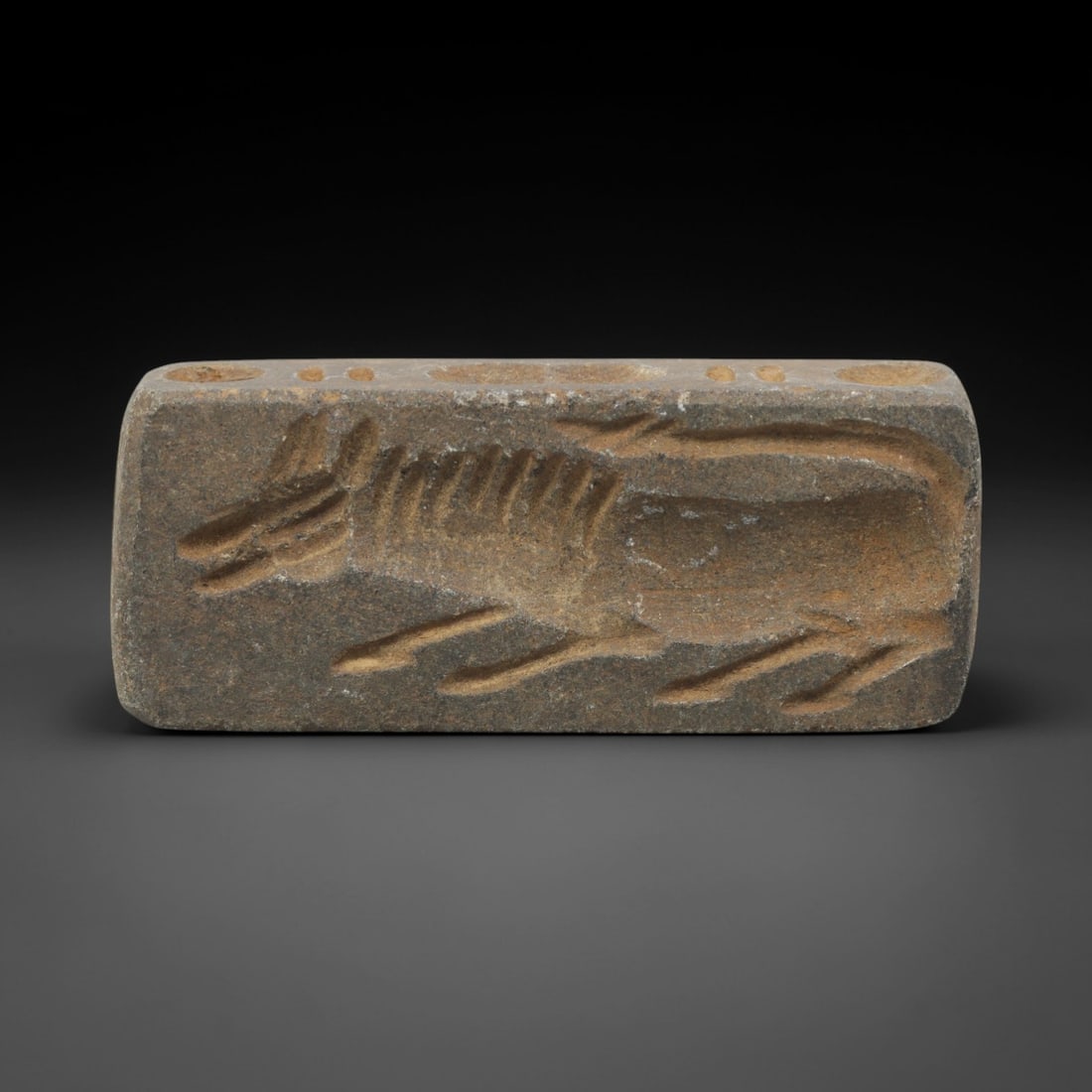 Ancient Steatite Animal Amulet - Near Eastern Carved Pendant, 88ZQ: Carved from steatite stone, this ancient Near Eastern amulet pendant features a raised relief animal motif with detailed linear detailing along its rectangular form, typical of protective amulets from