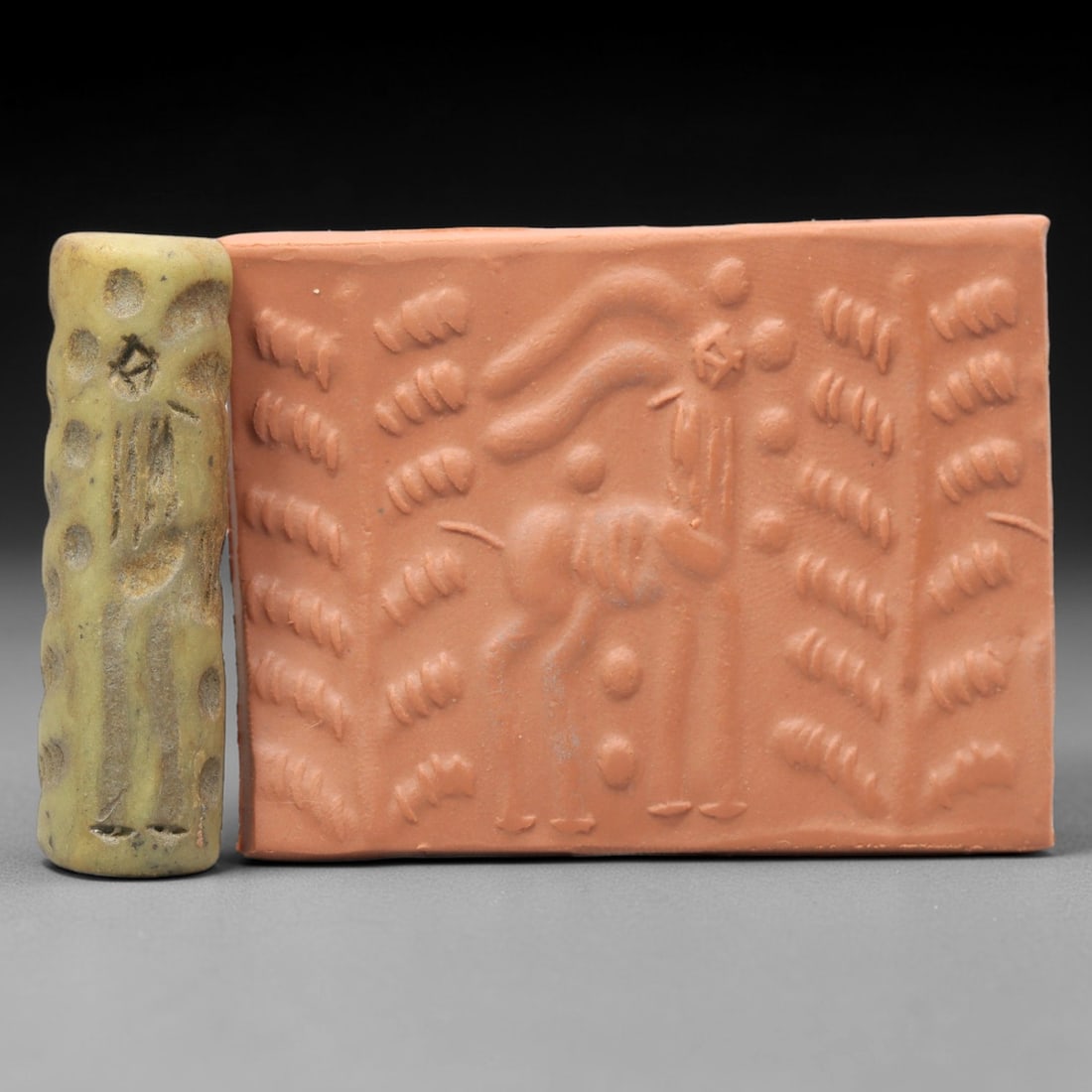 Ancient Serpentine Cylinder Seal - Mesopotamian, 43ZT: Carved from serpentine, this cylinder seal follows the classic cylindrical form of ancient Mesopotamian administrative and ritual artifacts. Attributed to the Bronze Age Mesopotamian cultures, this se