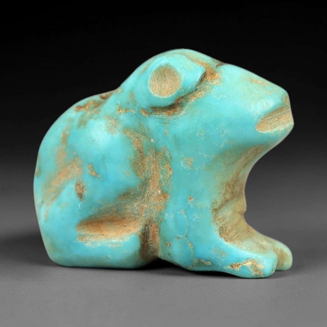 Ancient Turquoise Rodent Amulet - Near Eastern Ritual Pendant, 45AN: Carved from turquoise, this amulet depicts a stylized crouching rodent figure with rounded ears, a defined snout, and compact posture. The vibrant turquoise stone exhibits characteristic veining and e