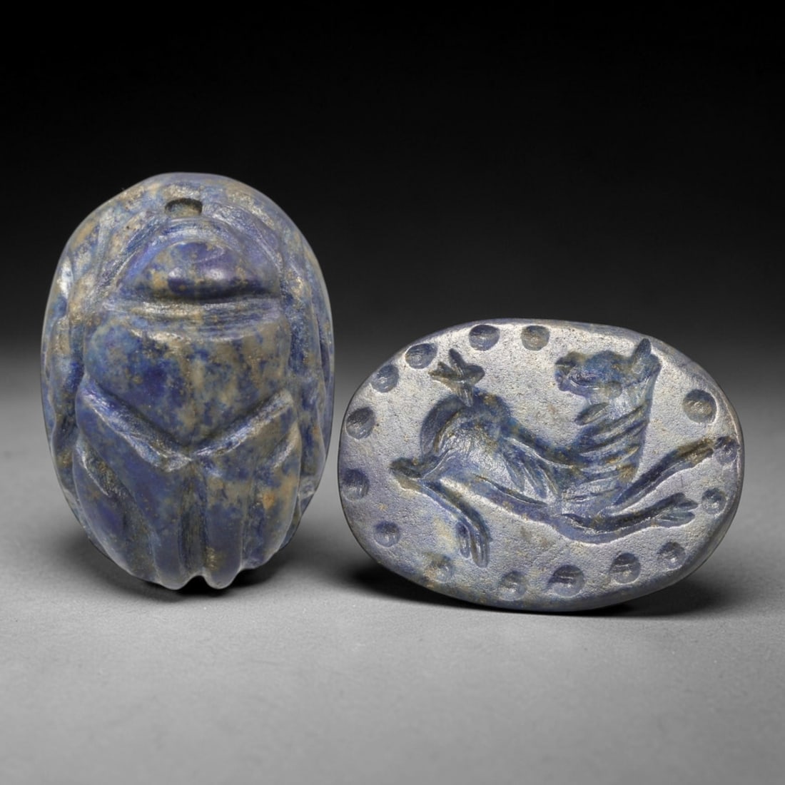 Ancient Lapis Lazuli Scarab - Near Eastern Zoomorphic Seal, 41XT: This artifact is hand-carved from lapis lazuli, employing traditional ancient lapidary techniques consistent with Near Eastern Bronze Age seal craftsmanship. The object takes the form of a scarab beet