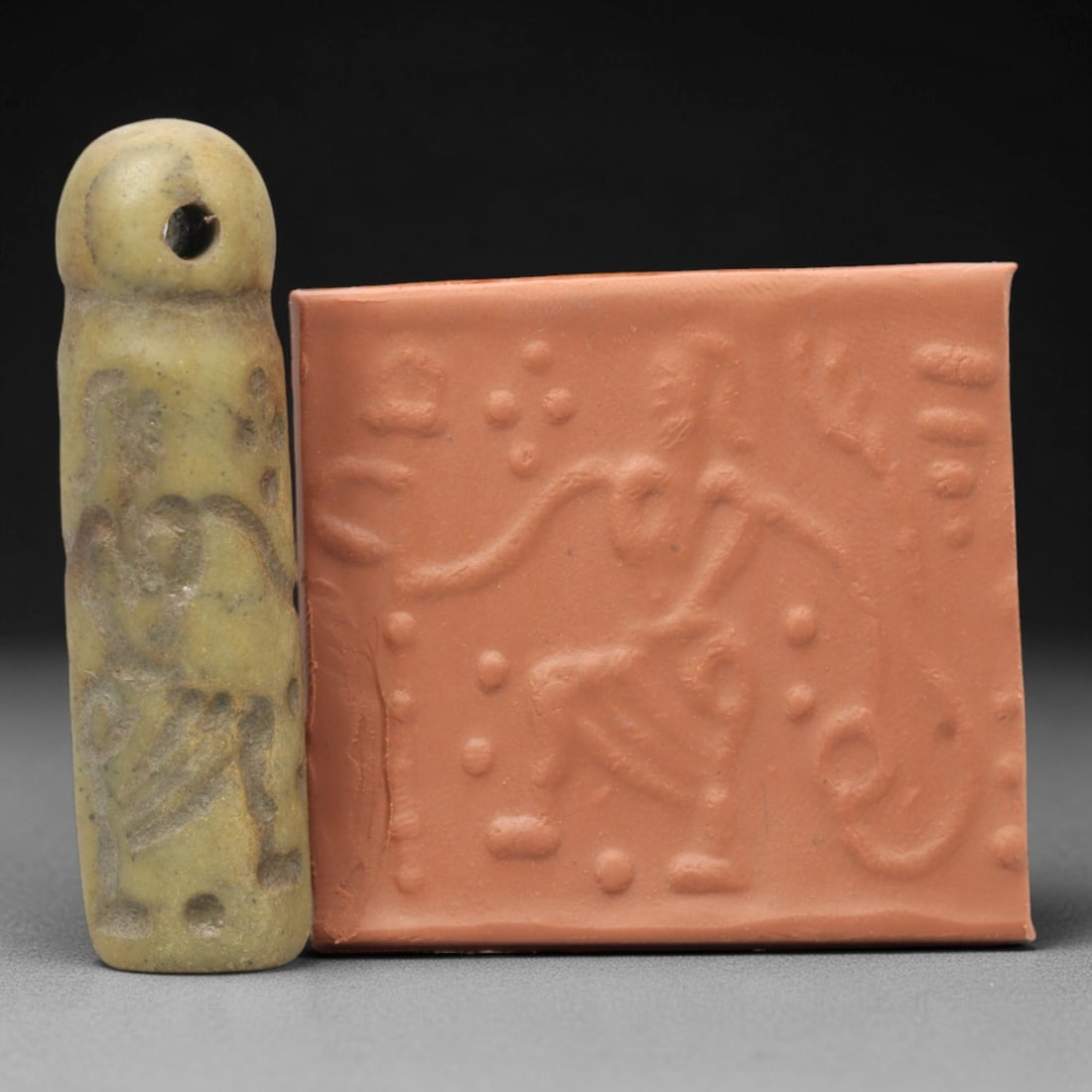 Ancient Serpentine Cylinder Seal - Mesopotamian, 49ZT: Carved from serpentine, this cylinder seal follows the classic cylindrical form of ancient Mesopotamian administrative and ritual artifacts. Attributed to the Bronze Age Mesopotamian cultures, this se