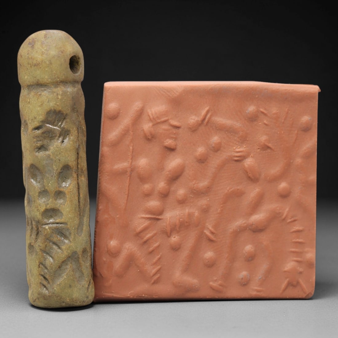 Ancient Serpentine Cylinder Seal - Mesopotamian, 57ZT: Carved from serpentine, this cylinder seal follows the classic cylindrical form of ancient Mesopotamian administrative and ritual artifacts. Attributed to the Bronze Age Mesopotamian cultures, this se