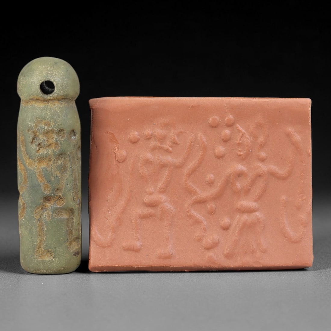 Ancient Serpentine Cylinder Seal - Mesopotamian, 86FX: Carved from serpentine, this cylinder seal follows the classic cylindrical form of ancient Mesopotamian administrative and ritual artifacts. Attributed to the Bronze Age Mesopotamian cultures, this se