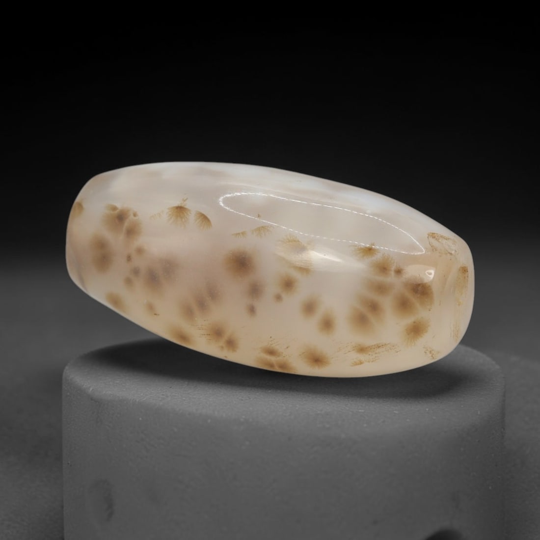 Ancient Agate Bead - Silk Road Bactrian Amulet, 66XT: This bead is carved from dendritic agate, showcasing fine lapidary workmanship consistent with ancient bead-making traditions of the Bactrian and Silk Road regions. The elongated barrel form features