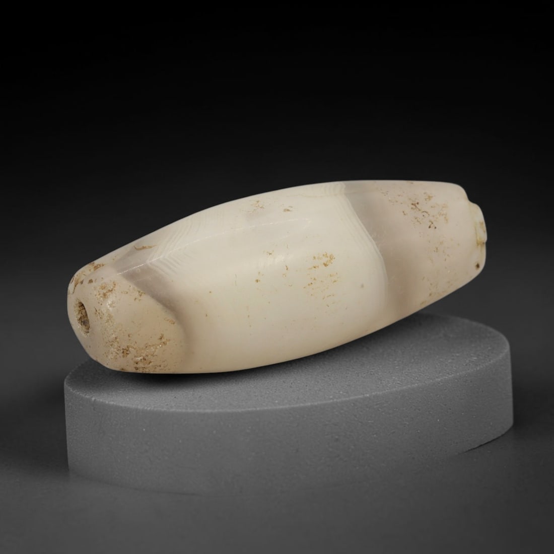 Ancient Agate Bead - Indus Valley Bactrian Pendant, 78XT: This bead is carved from naturally banded agate, showcasing expert lapidary workmanship consistent with ancient bead-making traditions of the Indus Valley and Bactrian regions. The elongated olive for