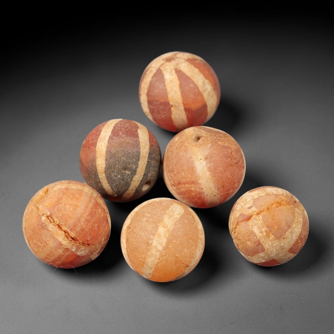 Ancient Carnelian Bead - Gandhara Etched Bead, 41BE: These are six ancient Gandhara etched carnelian beads, crafted from carnelian stone with traditional etching techniques applied to create distinct linear and geometric decorative patterns across the s