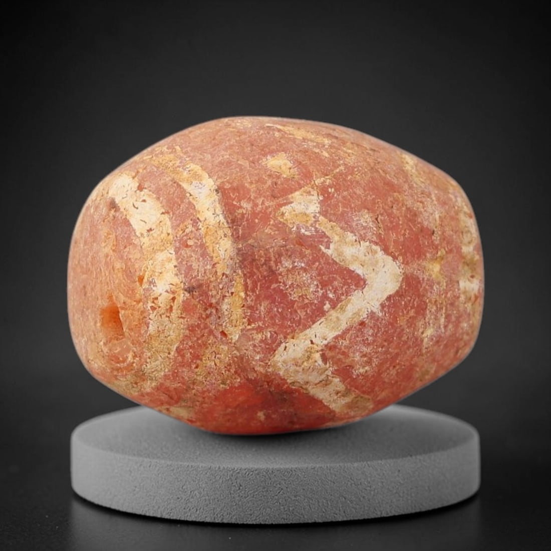Ancient Carnelian Bead - Gandhara Etched Amulet, 5BE: This ancient Gandhara etched carnelian bead originates from archaeological excavations, crafted from rich reddish-orange carnelian with hand-etched geometric chevron and banded motifs characteristic o