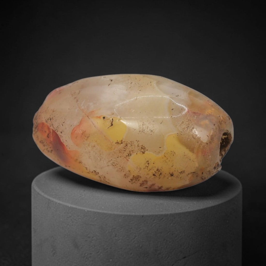 Ancient Agate Bead - Afghan Faceted Barrel Bead, 27XW: This bead is carved from translucent honey-yellow and amber-hued banded agate, shaped into a refined faceted barrel form with a precisely centered axial drill hole, characteristic of ancient Afghan la