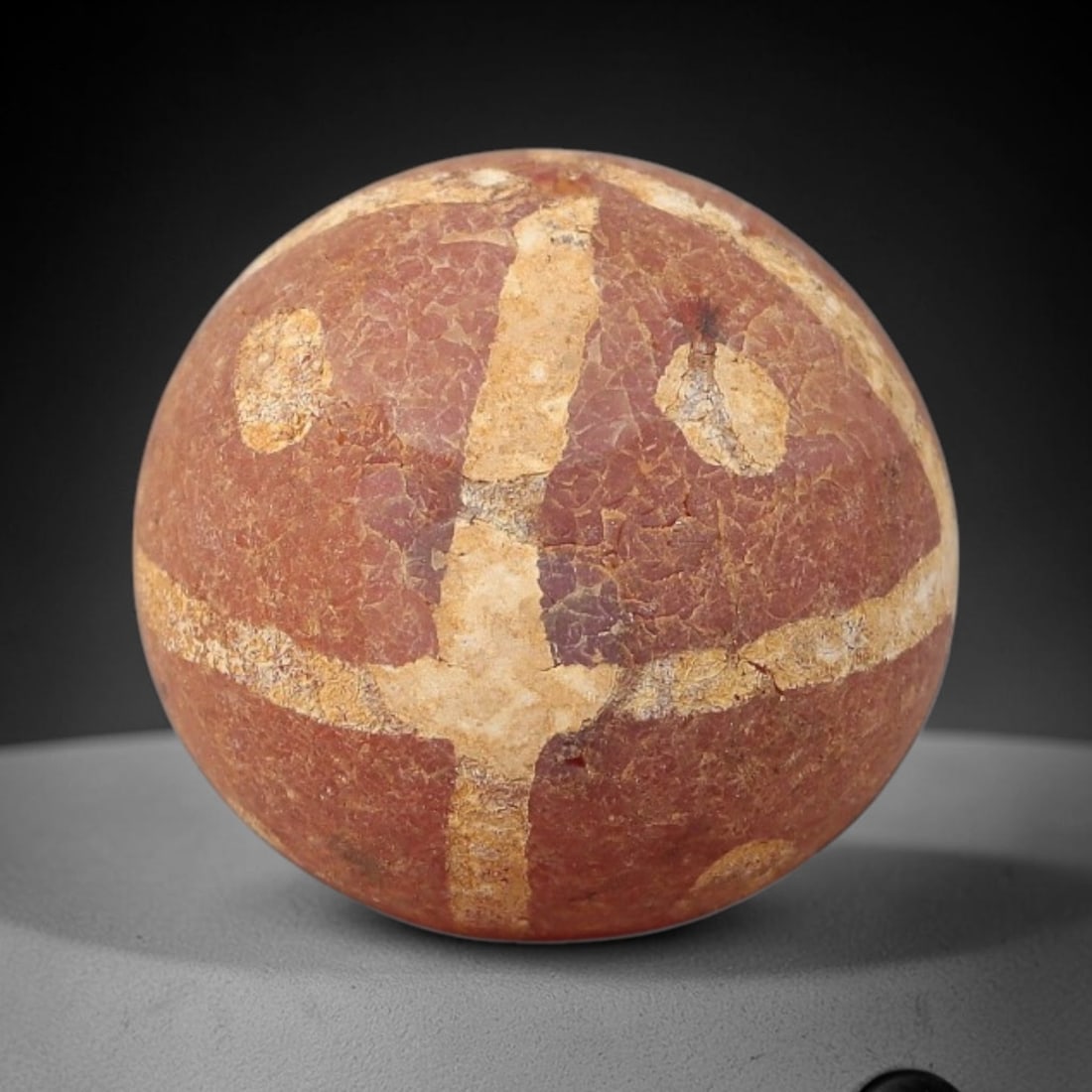 Ancient Carnelian Bead - Gandhara Etched Amulet (Sphere Form), 23BE: This ancient Gandhara etched carnelian bead takes the form of a perfectly rounded sphere, crafted from rich reddish-brown carnelian with distinct, hand-etched cross and circular motifs characteristic