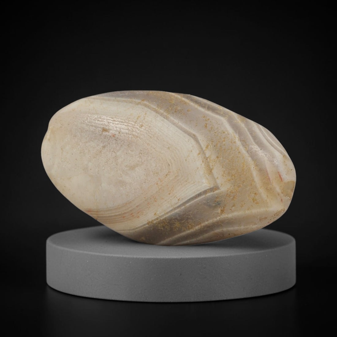 Ancient Agate Bead - Bactrian Banded Amygdaloid Bead, 8XW: This bead is fashioned from banded agate with layers of creamy-white and pale grey mineralization, shaped into a refined amygdaloid (almond-shaped) form with a precisely centered axial drill hole, cha