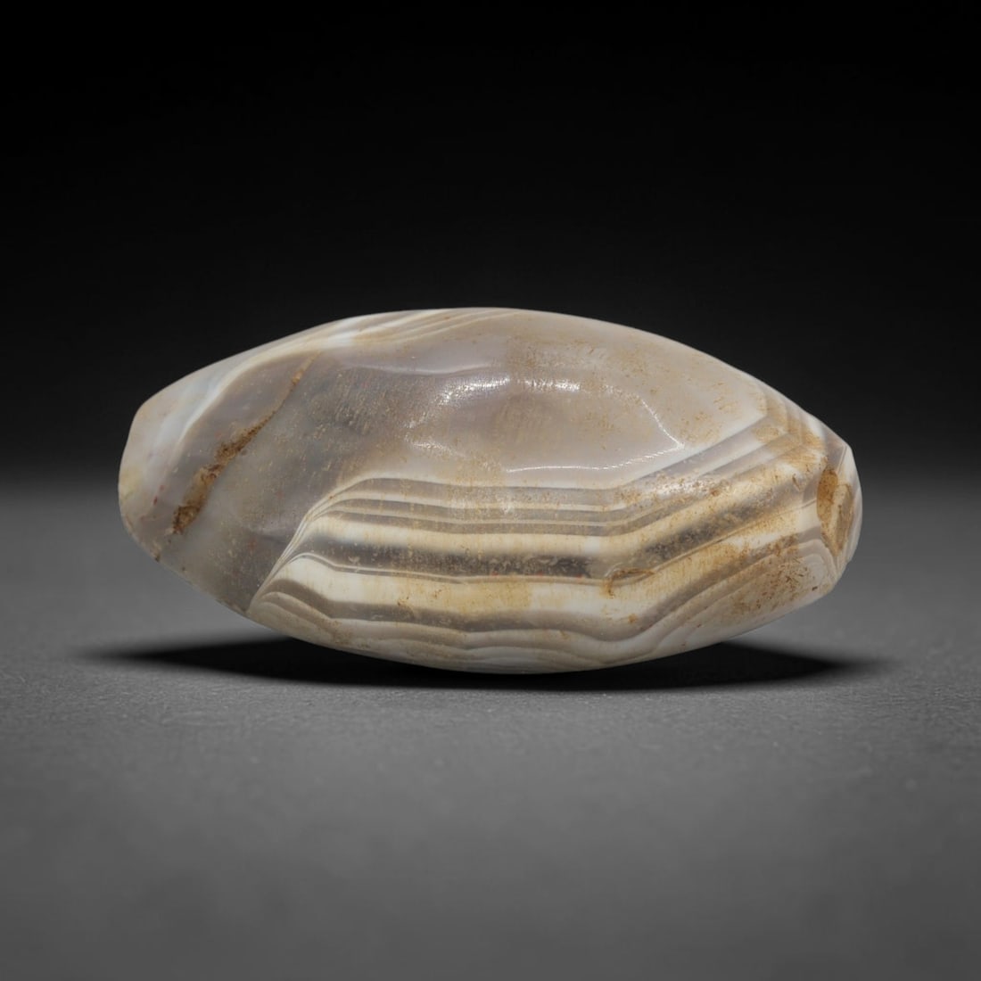 Ancient Banded Agate Bead - Indus Valley Bactrian Pendant, 97XT: This bead is masterfully carved from naturally banded translucent agate, showcasing exceptional lapidary craftsmanship consistent with ancient bead-making traditions of the Indus Valley and Bactrian r