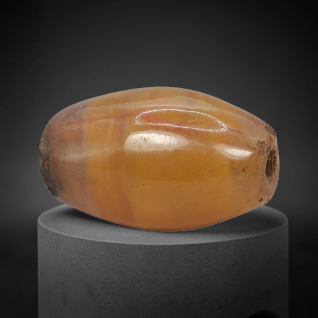 Ancient Banded Carnelian Agate Bead - Western Asiatic Amulet, 65WJ: This bead is masterfully carved from richly banded translucent carnelian agate, showcasing exceptional lapidary craftsmanship consistent with ancient bead-making traditions of the Indus Valley and Bac