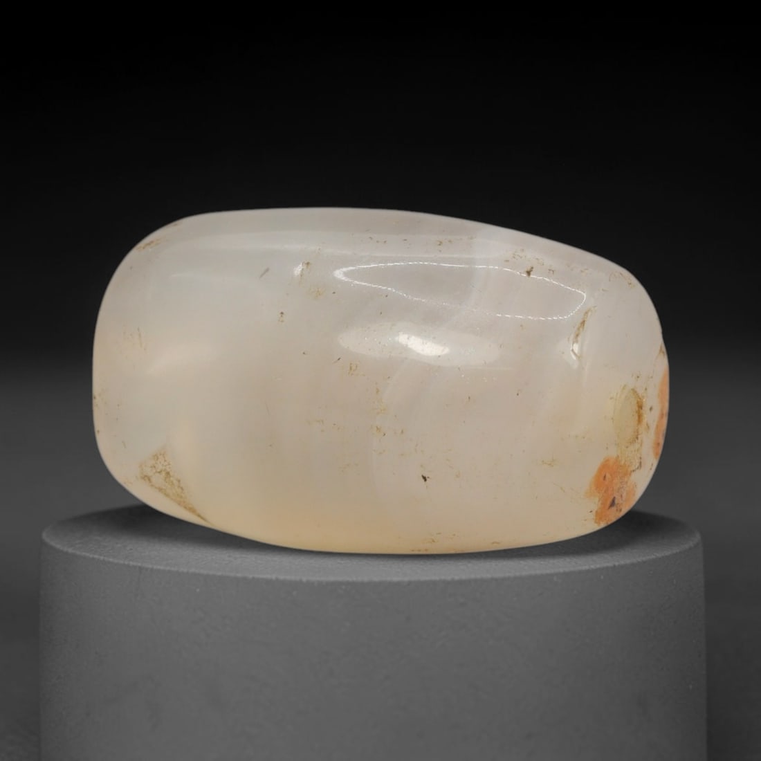 Ancient Agate Bead - Western Asiatic Miniature Amulet, 83XT: This bead is expertly carved from natural translucent agate, showcasing refined lapidary craftsmanship consistent with ancient Western Asian (Bactrian or Indus Valley) bead-making traditions. The comp