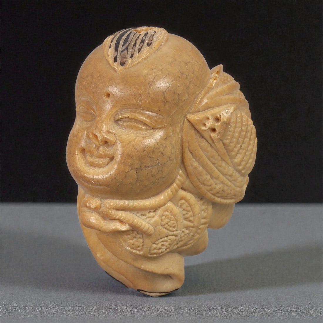 An East Asian Carved Head Ornament, 20th Century, 95FC (1 of 3)