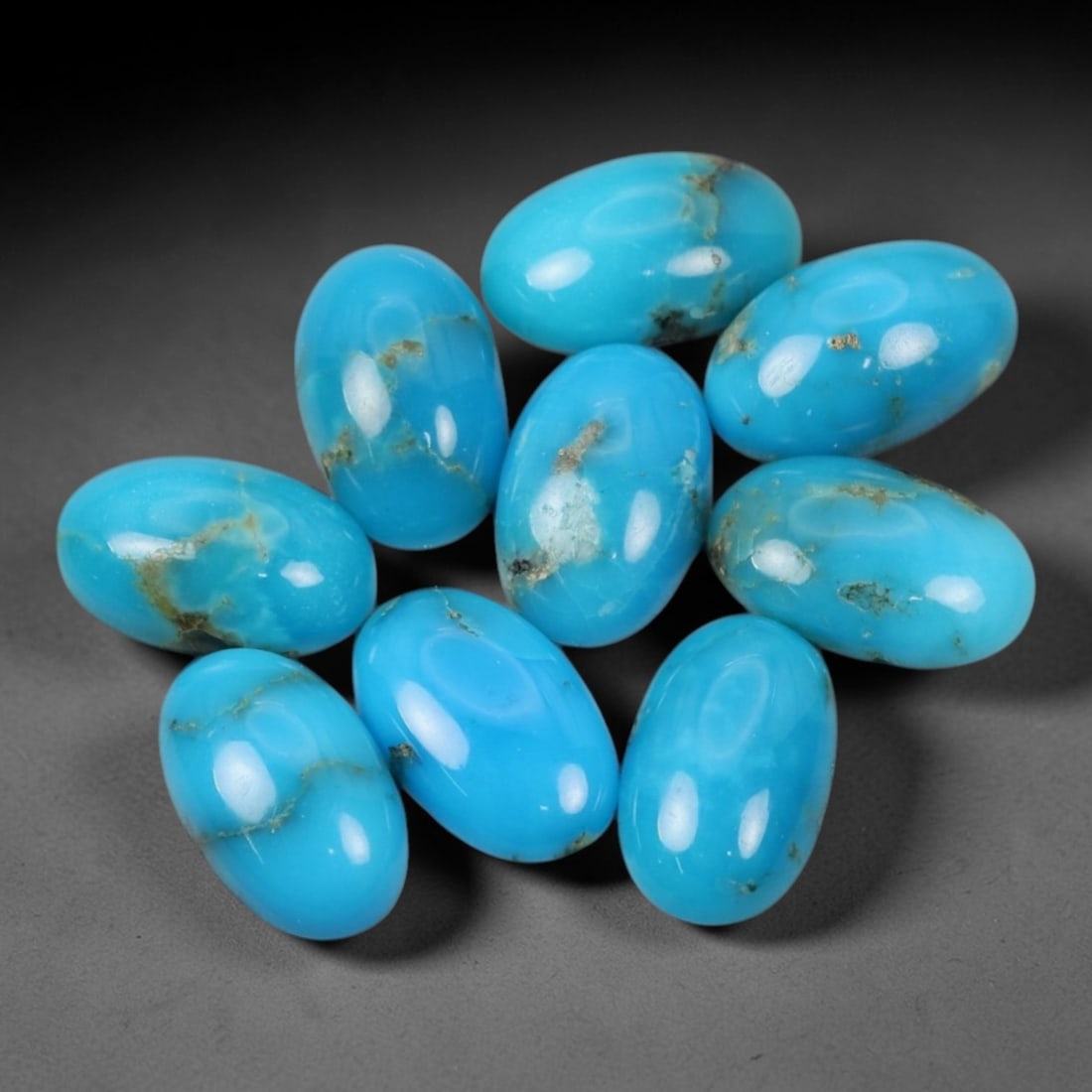 11.84 Carats Sleeping Beauty Blue Arizona Turquoise Cabochon Parcel, 19XP: This exceptional parcel of Arizona turquoise cabochons features the coveted Sleeping Beauty Blue hue-a vivid, saturated sky blue with a smooth, velvety texture that is highly prized by collectors and