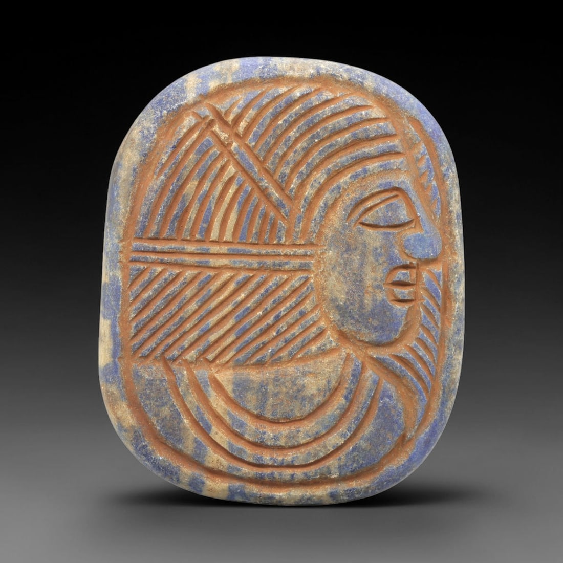 Near Eastern Lapis Lazuli Plaque - Tribal Art Pharaoh Head Relief, 48ZY: Carved from natural lapis lazuli stone, this Near Eastern tribal art plaque relief features a masterfully rendered profile of a pharaoh, a motif deeply rooted in the cultural and artistic heritage of