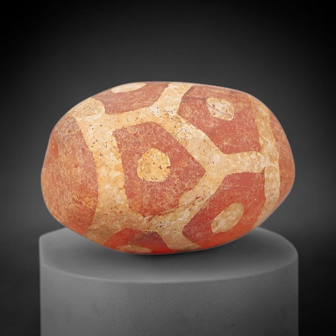 Ancient Carnelian Bead - Gandhara Etched Amulet, 19BD: This ancient Gandhara etched carnelian bead originates from archaeological excavations, crafted from rich red carnelian with intricate hand-etched geometric eye motifs characteristic of Gandhara perio