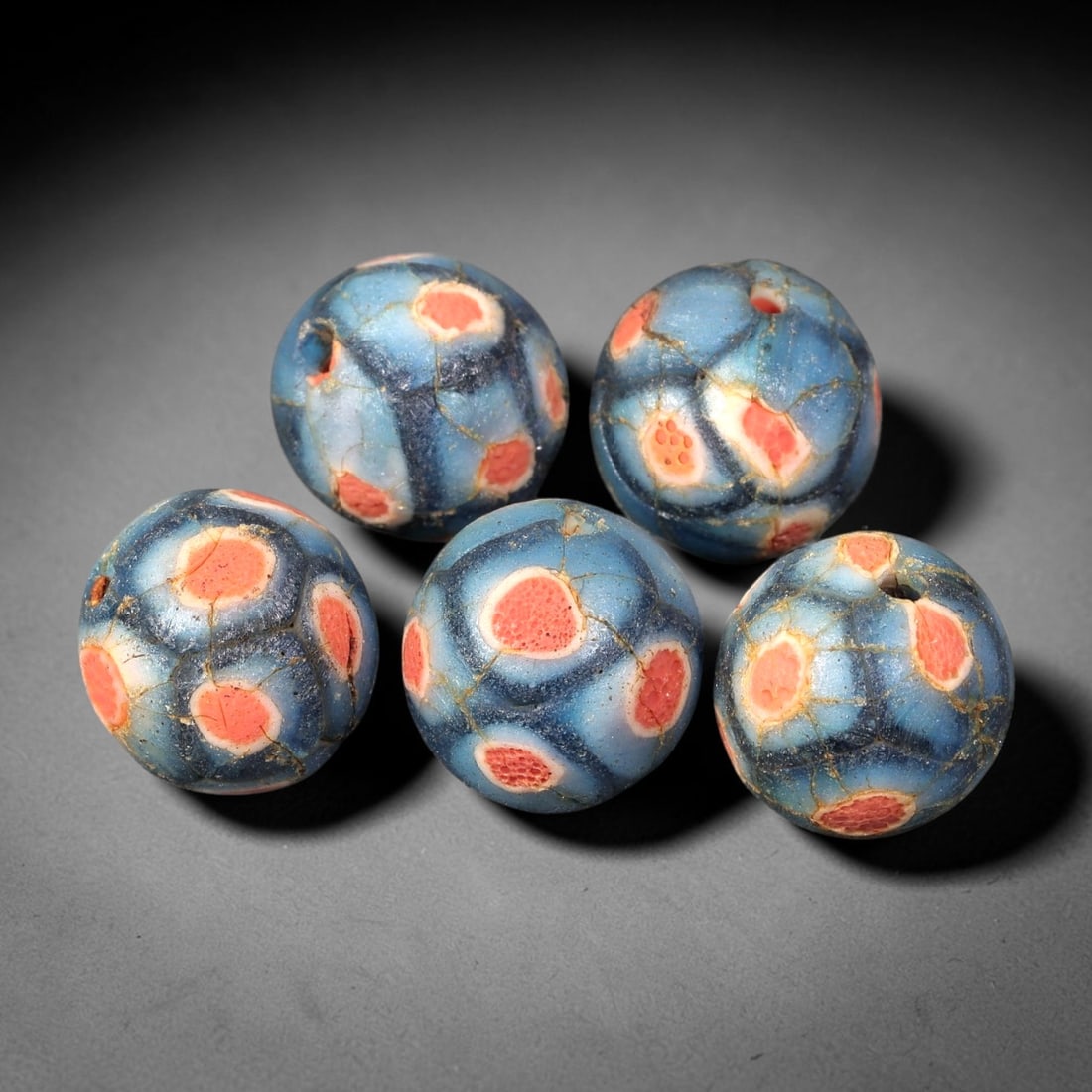 Old Glass Mosaic Beads - Phoenician Style Spherical Beads, 81BG: Set of five spherical old glass mosaic beads, crafted from fused colored glass segments to create a repeating geometric dot motif across each surface. Each bead features vibrant pinkish-red circular i