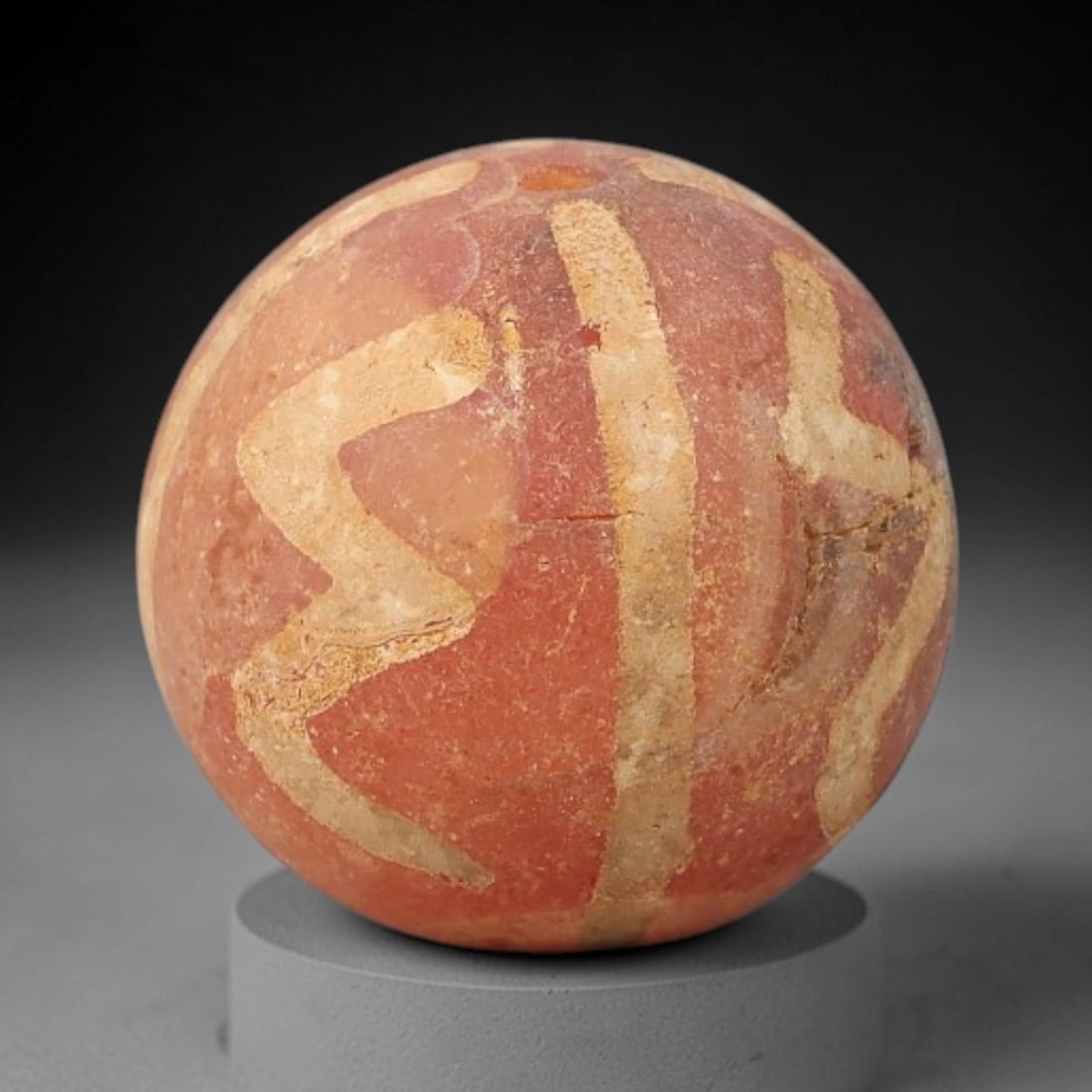 Ancient Carnelian Bead - Gandhara Etched Amulet (Sphere Form), 32BE: This ancient Gandhara etched carnelian bead takes the form of a perfectly rounded sphere, crafted from rich pinkish-red carnelian with hand-etched abstract geometric and banded motifs characteristic o