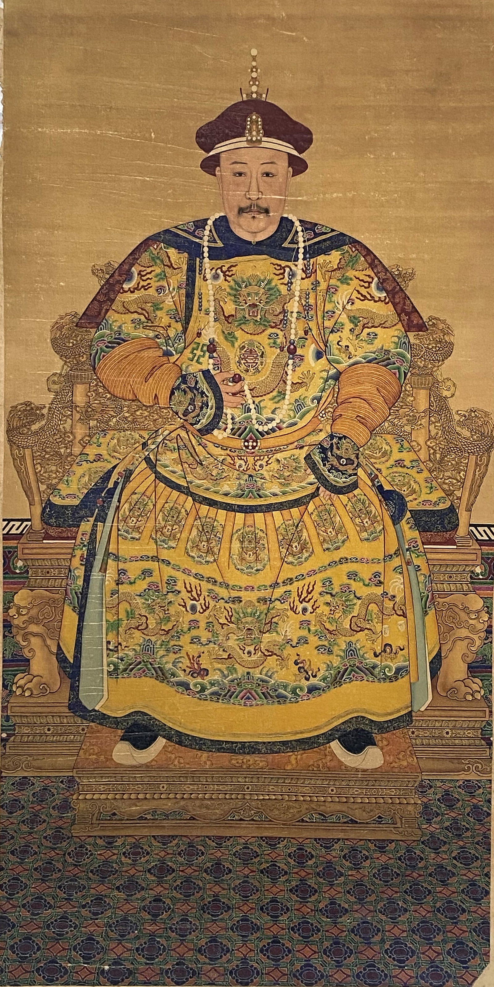 A Chinese Ink and Color Art Print of the Jiaqing Emperor, 20th Century, 10FK: Produced using fine art printing processes on aged paper stock, the work is an ink and color art print executed in the traditional Chinese imperial portrait idiom. The composition features the Jiaqing