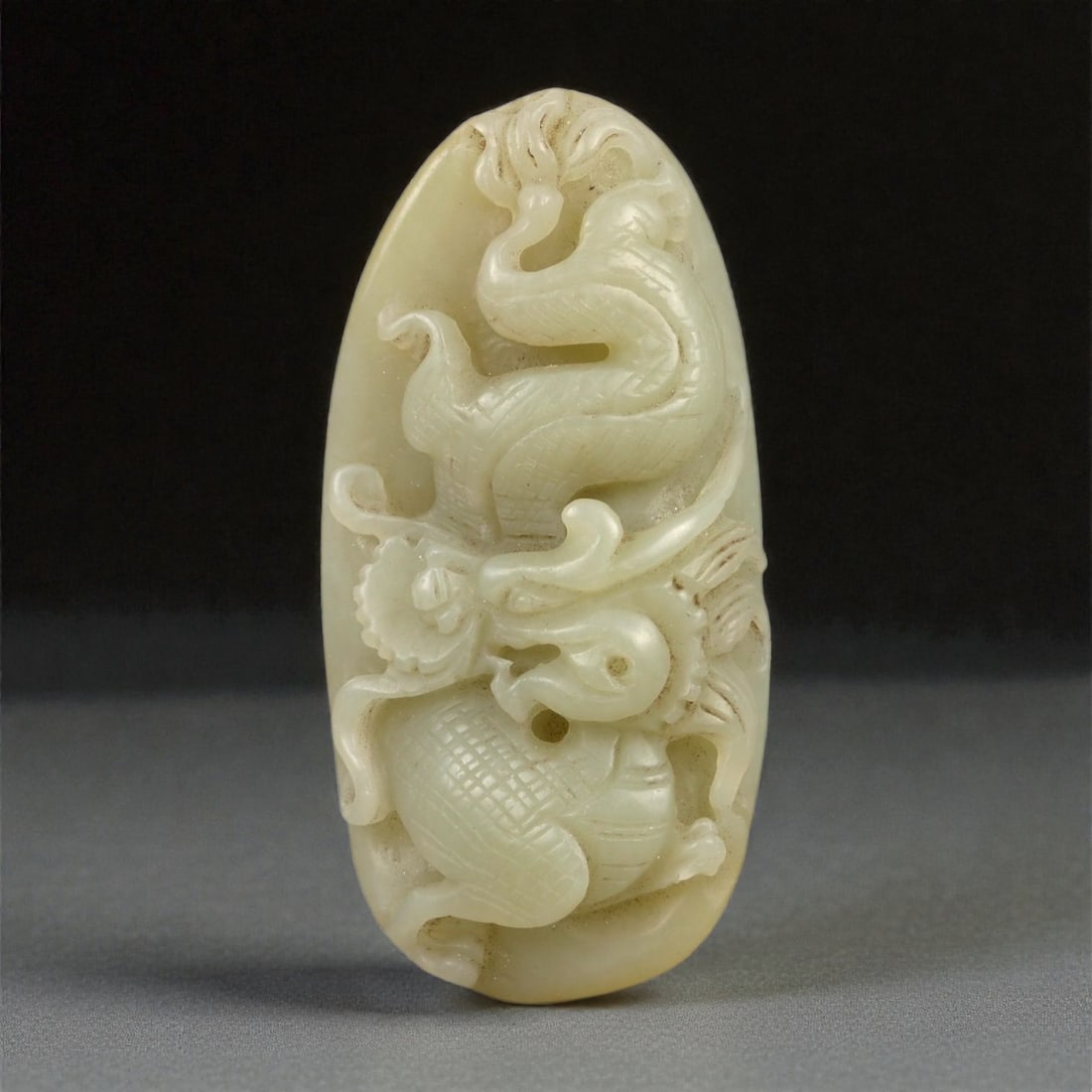 A Chinese Nephrite Jade Dragon Pendant, 20th Century, 57FA (1 of 2)