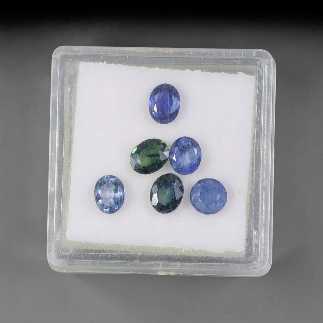 2.47 Carats Natural Ceylon Blue Sapphire - Oval Faceted Loose Gemstone Lot, 74WE: Natural oval-faceted Ceylon blue sapphire lot, sourced from the legendary Sri Lankan (Ceylon) sapphire deposits. This curated collection features exceptional sapphires with a stunning range of vivid,