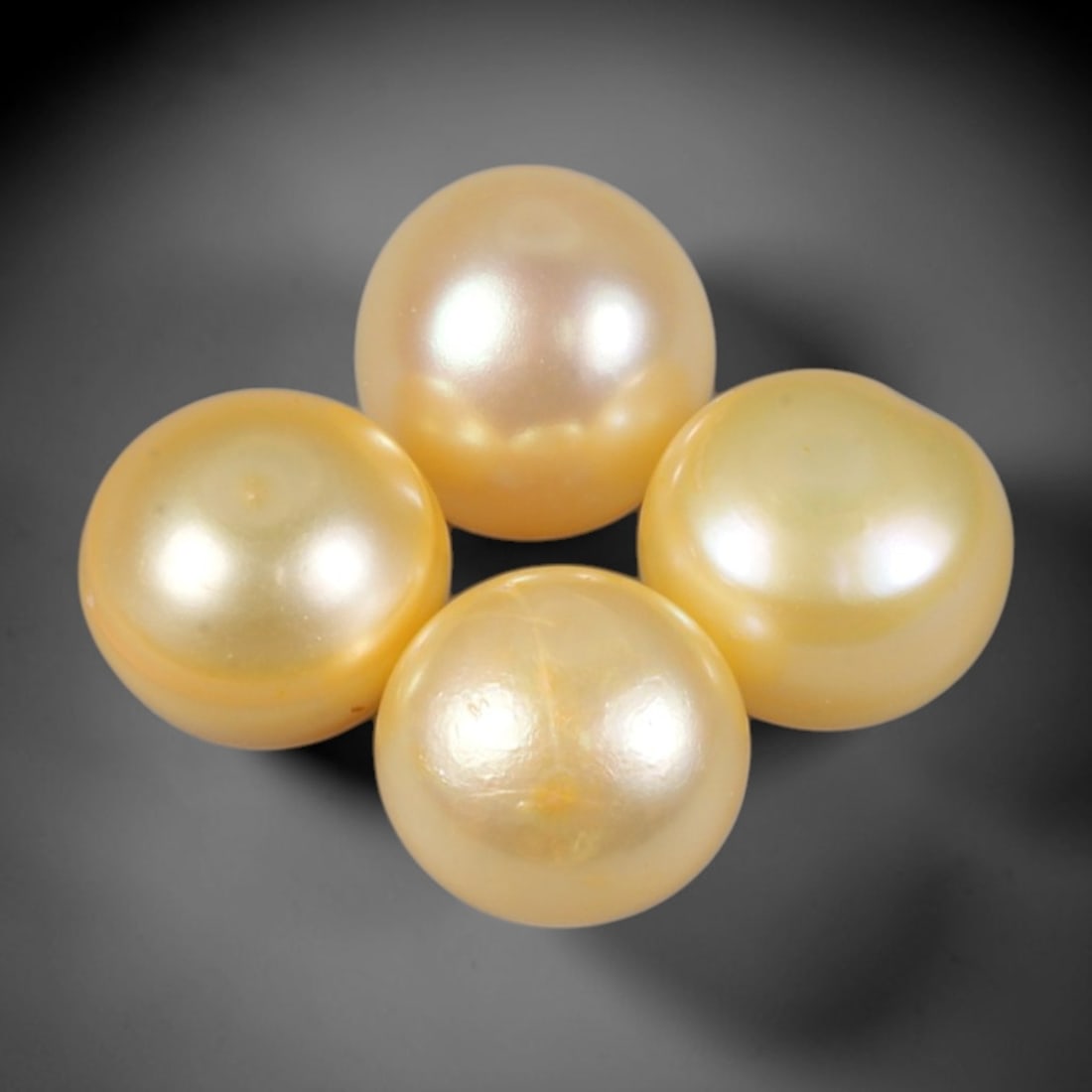 20.93 Carats Freshwater Pearl - Drilled Round Pearl, 52WE: Drilled freshwater pearl, crafted from natural freshwater pearl material. The pearl exhibits a soft, creamy golden hue with gentle luster and iridescence, characteristic of cultured freshwater pearls.
