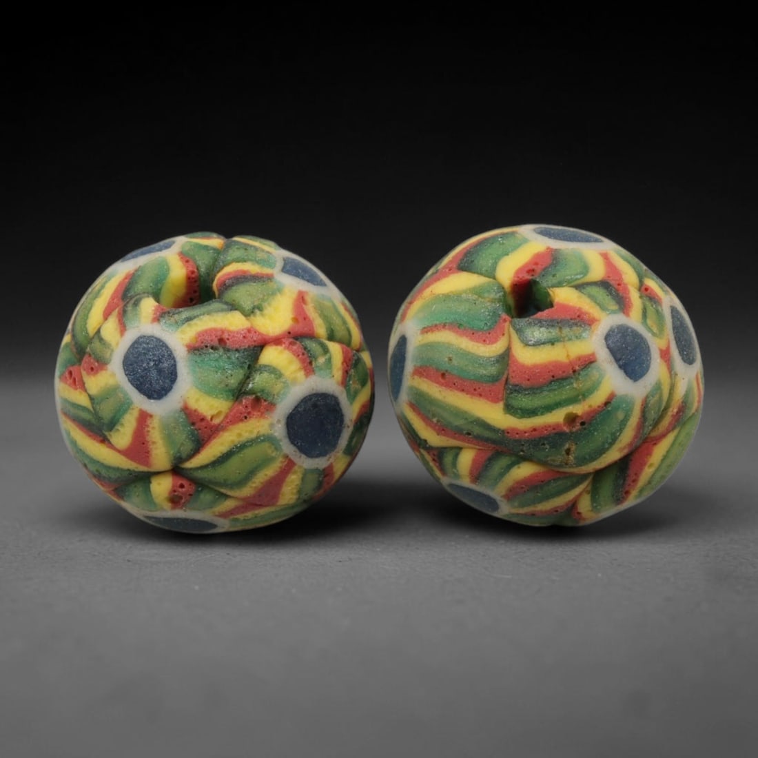 Old Glass Eye Beads - Phoenician Style Spherical Beads, 86WD: Set of two spherical old glass eye beads, crafted from fused colored glass segments to create a repeating concentric eye motif across each surface. Each bead features raised blue and white layered eye