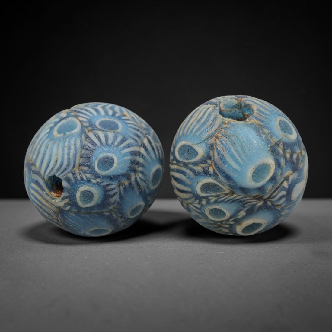 Old Glass Eye Beads - Phoenician Style Spherical Beads, 83WD: Set of two spherical old glass eye beads, crafted from fused colored glass segments to create a repeating concentric eye motif across each surface. Each bead features raised blue and white layered eye
