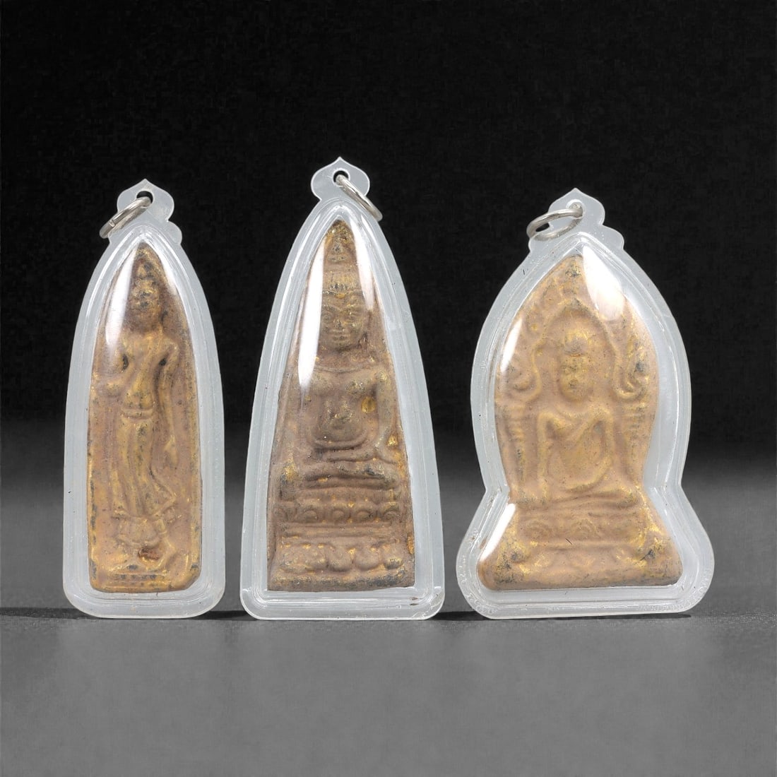 A Group of Three Gilt Buddhist Amulets in Acrylic Cases, 20th Century, 23FJ (1 of 2)
