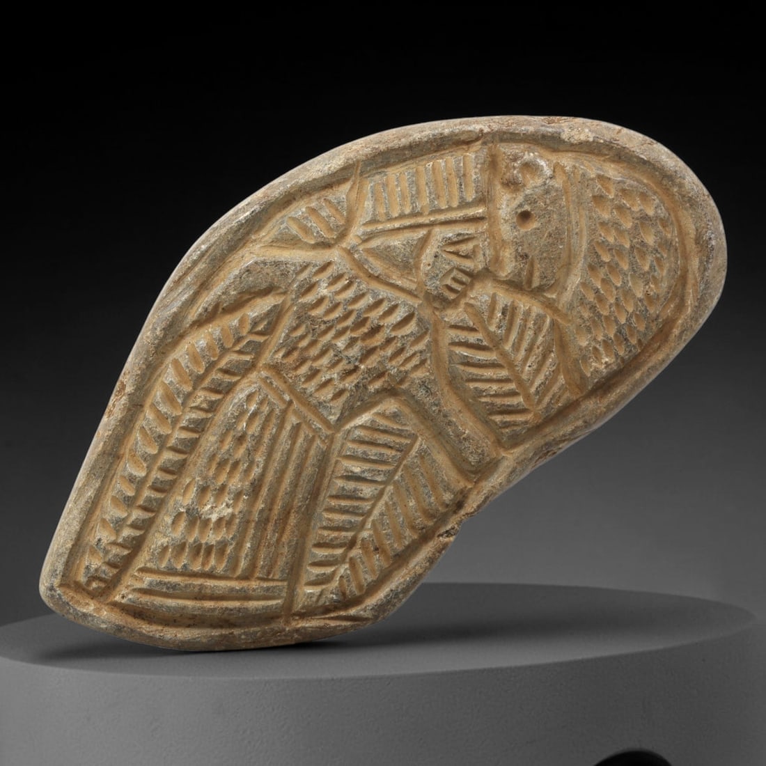 Ancient Stone Plaque Relief - Near Eastern Human & Feline Figural Plaque, 9ZY: Carved from a single piece of stone, this irregularly shaped relief plaque depicts a stylized human figure beside a feline, rendered in the linear, incised artistic tradition of the ancient Near East.