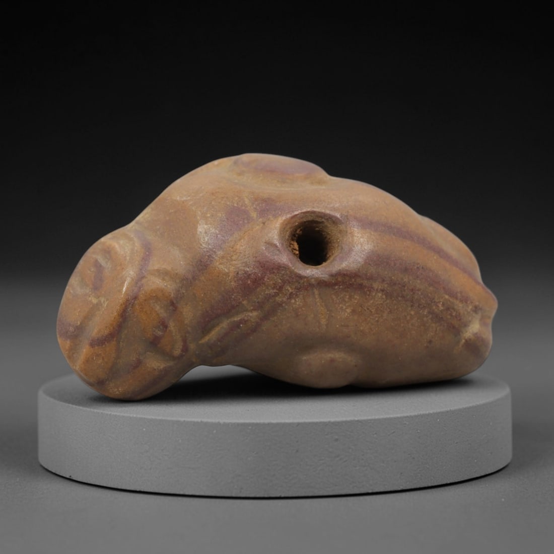 Ancient Steatite Zoomorphic Amulet - Near Eastern Carved Figurine, 2ZQ: Carved from steatite, this ancient Near Eastern zoomorphic amulet features a stylized animal form with detailed body motifs and a suspension hole, typical of early Near Eastern ritual artifacts. The c