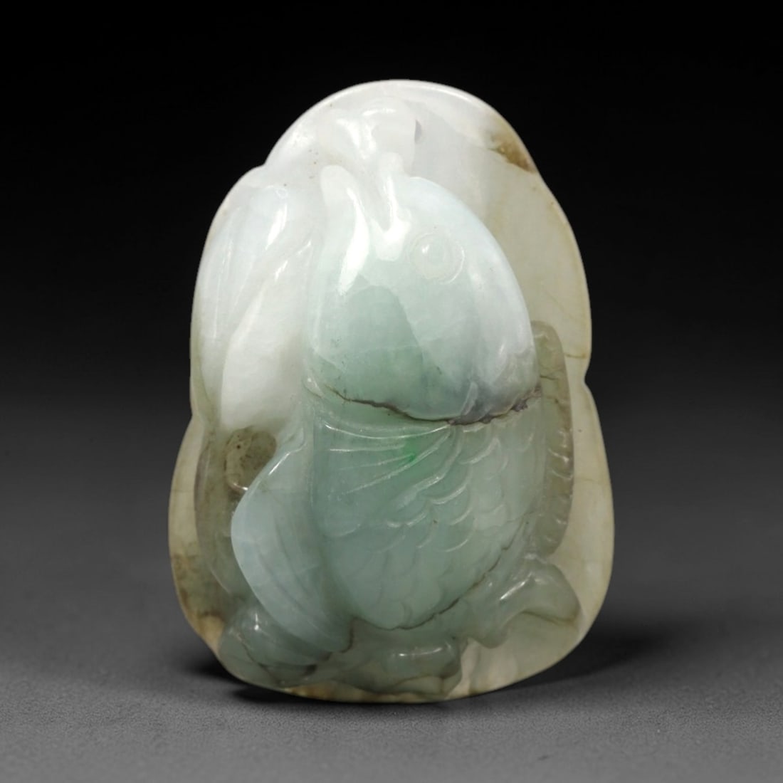 A Chinese Jadeite Jade Fish-Form Pendant Plaque, 20th Century, 48FR (1 of 2)