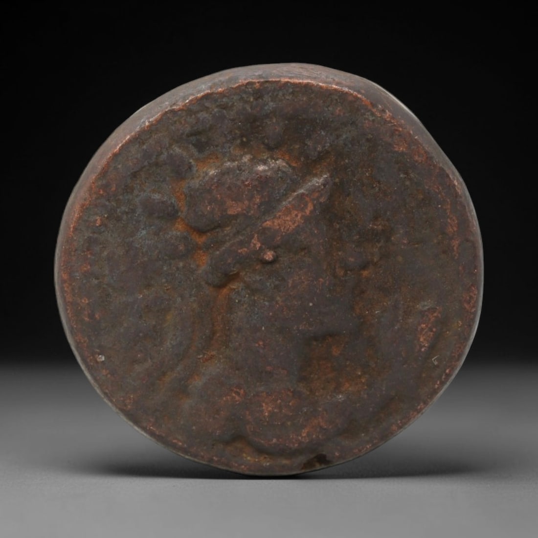 KUSHAN EMPIRE: Horseman Type Bronze Coin, 20mm, 6.53g, 6AK: This small bronze coin from the Kushan Empire features a prominent horseman motif on the obverse, a key iconographic type of Kushan numismatics, with a divine or royal bust on the reverse. The patinat