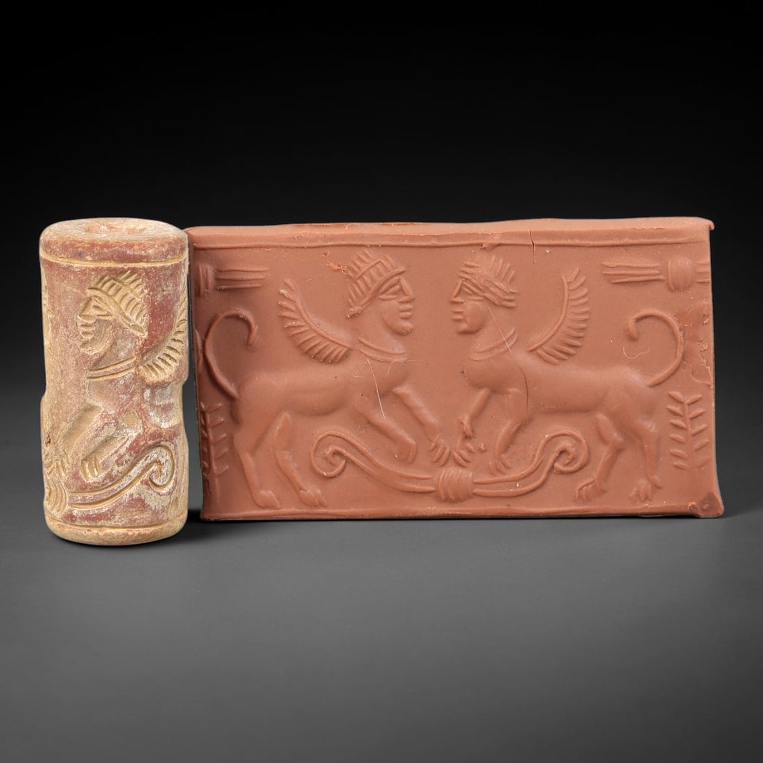 Ancient Stone Cylinder Seal - Mesopotamian Amulet Relic, 15BH: Carved from a light, weathered stone, this miniature cylindrical seal features incised decoration depicting a winged human-headed sphinx, with detailed linear carving defining the figure's facial feat