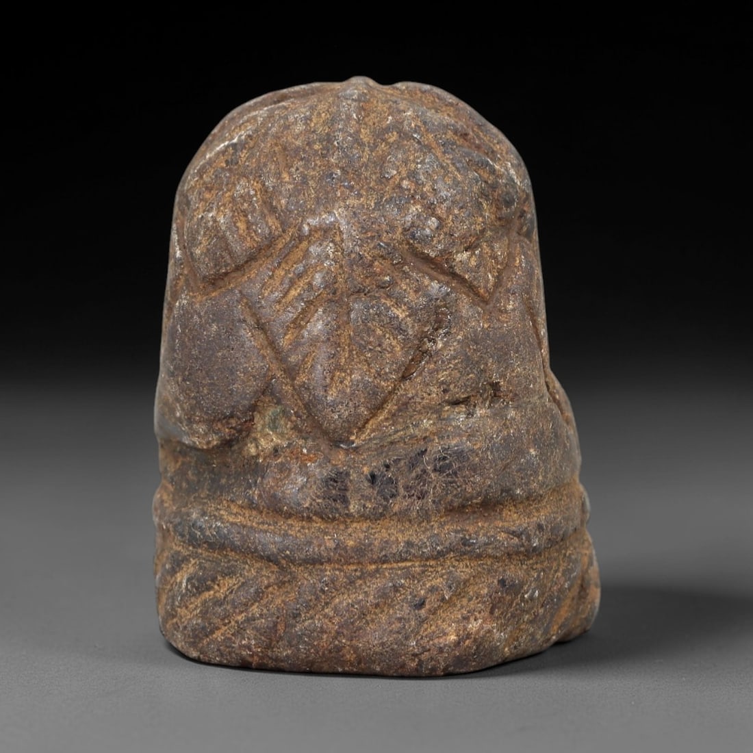 Ancient Stone Weight - Silk Road Commodity Relic, 18AM: This compact stone weight is carved from a dense, granular stone with a mottled, earthy patina showing subtle ochre and dark mineral inclusions, consistent with Silk Road period artifacts. The form fe