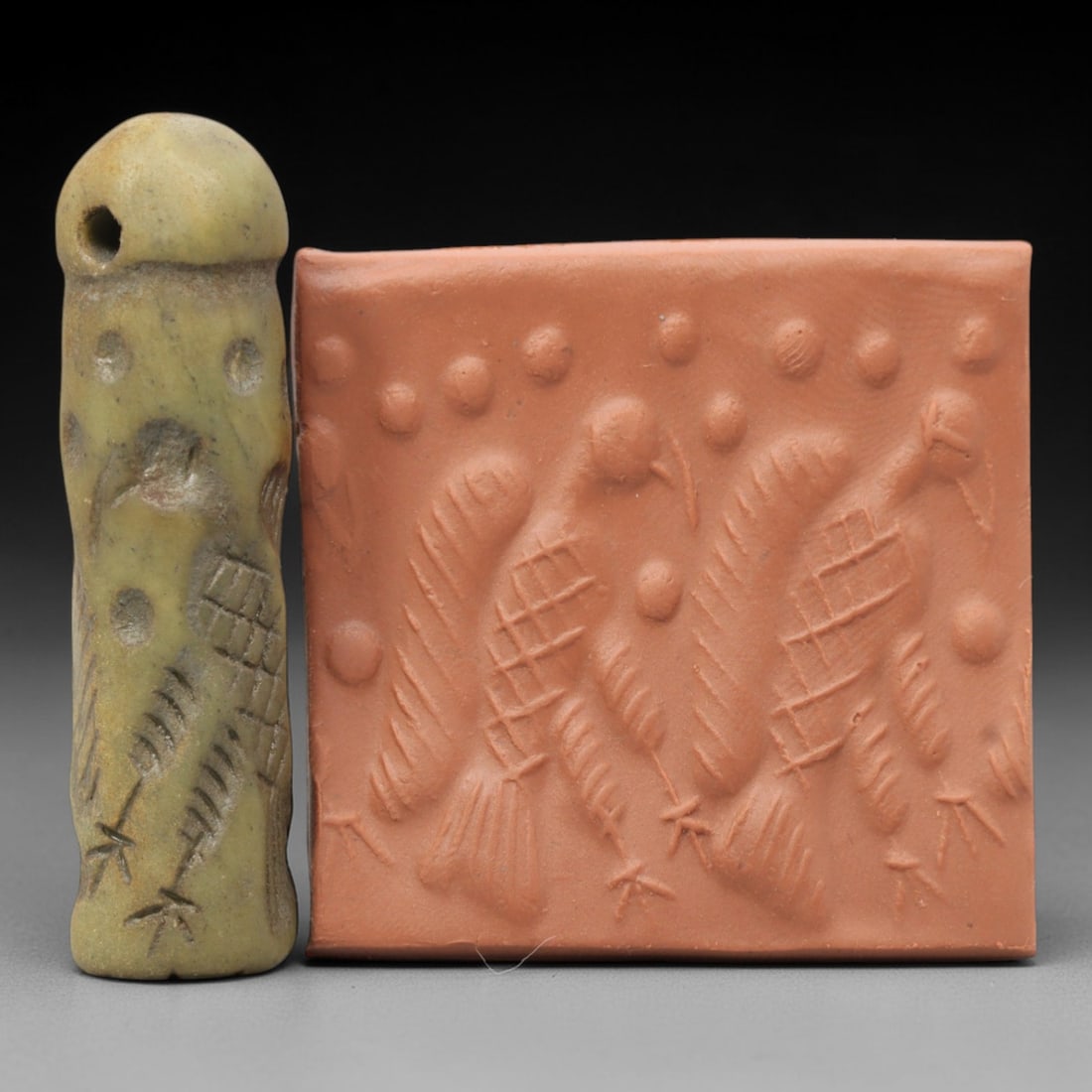 Ancient Serpentine Cylinder Seal - Mesopotamian, 46ZT: Carved from serpentine, this cylinder seal follows the classic cylindrical form of ancient Mesopotamian administrative and ritual artifacts. Attributed to the Bronze Age Mesopotamian cultures, this se