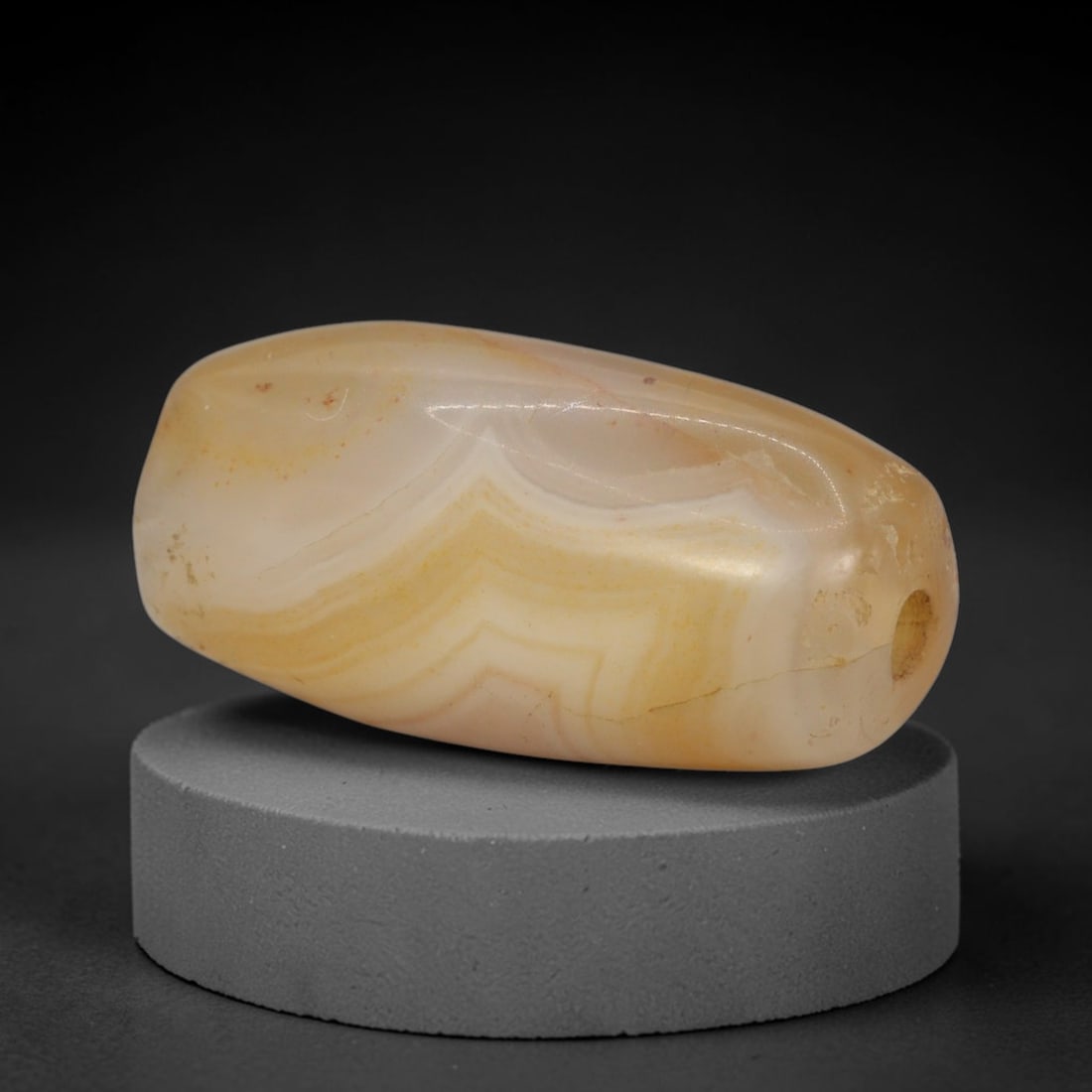 Ancient Agate Bead - Silk Road Bactrian Amulet, 77XT: This bead is carved from naturally banded agate, exhibiting expert lapidary craftsmanship characteristic of ancient Bactrian and Silk Road bead-making traditions. The barrel form features a central dr